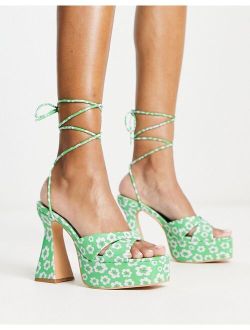 platform heeled sandals in green floral print