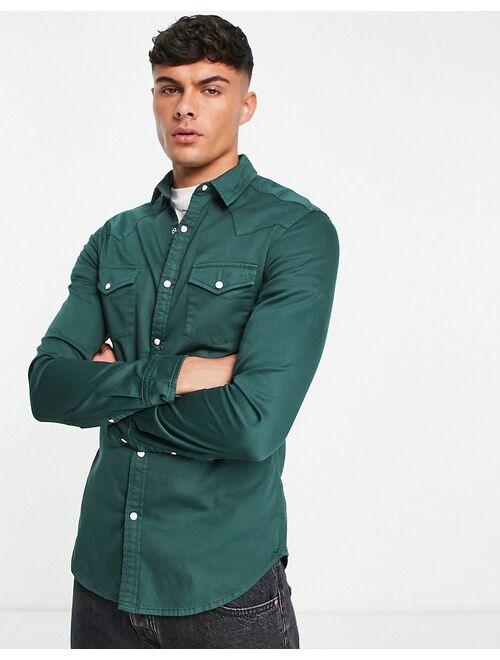 ASOS DESIGN skinny denim shirt in forest green