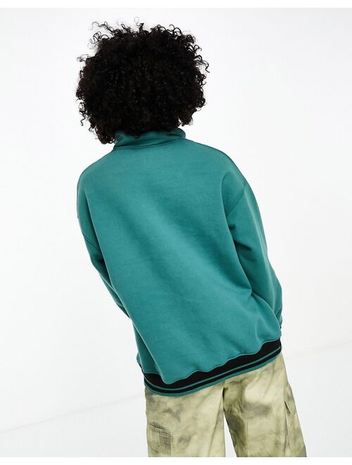 Daisy Street half zip sweatshirt with bulldogs graphic in washed green