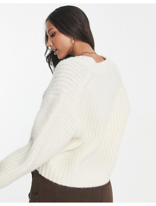 ASOS Tall ASOS DESIGN Tall premium chunky V neck oversized sweater in fluffy yarn in cream