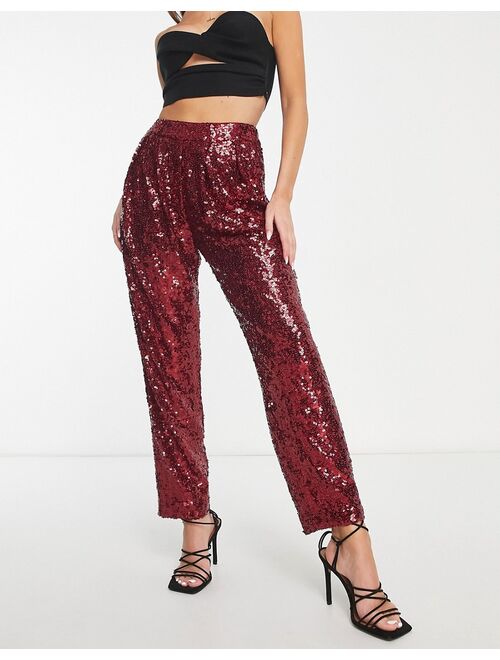 ASOS DESIGN sequin slouchy pants in ruby