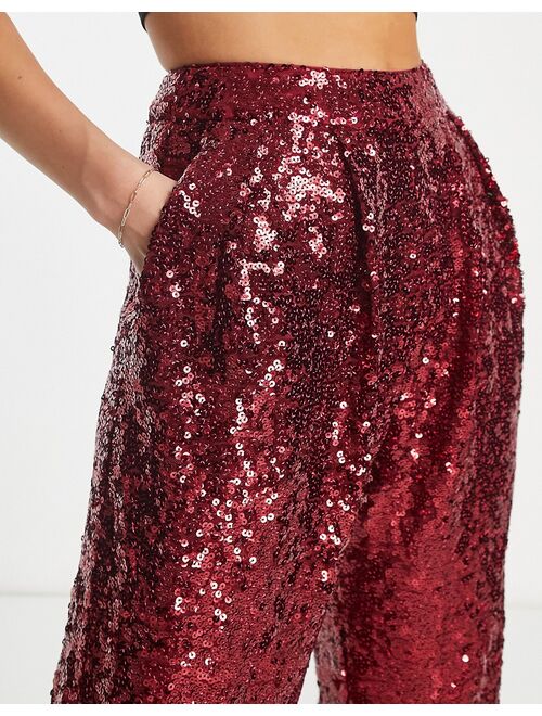 ASOS DESIGN sequin slouchy pants in ruby