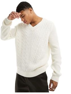 knit sweater with spliced cable detailing in cream