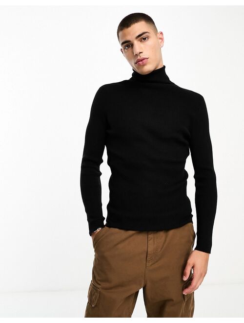 COLLUSION knitted roll neck sweater in black