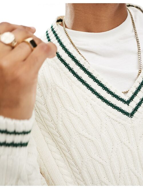 ASOS DESIGN oversized cable knit cricket sweater in cream with green tipping