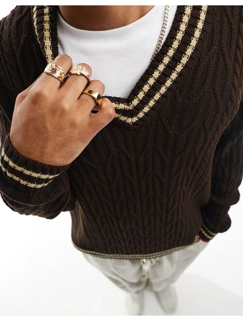 ASOS DESIGN oversized cable knit cricket sweater in brown with ecru tipping