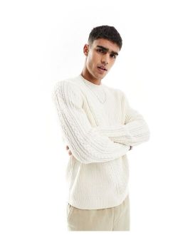 knit sweater with spliced cable detailing in cream