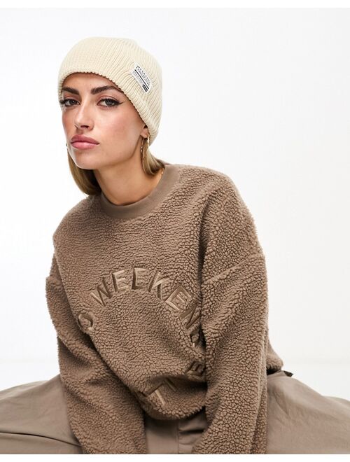 ASOS Weekend Collective fisherman beanie with woven label