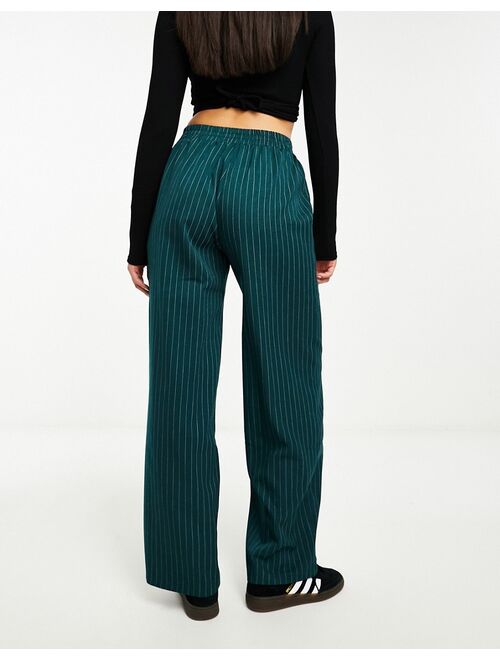 ASOS DESIGN pull on pants in green stripe