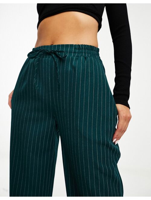 ASOS DESIGN pull on pants in green stripe