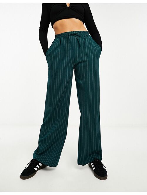 ASOS DESIGN pull on pants in green stripe