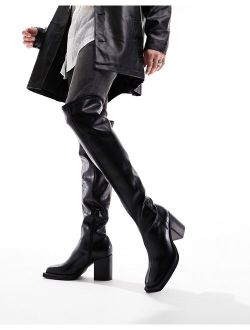 over the knee heeled chelsea boots on chunky sole in black