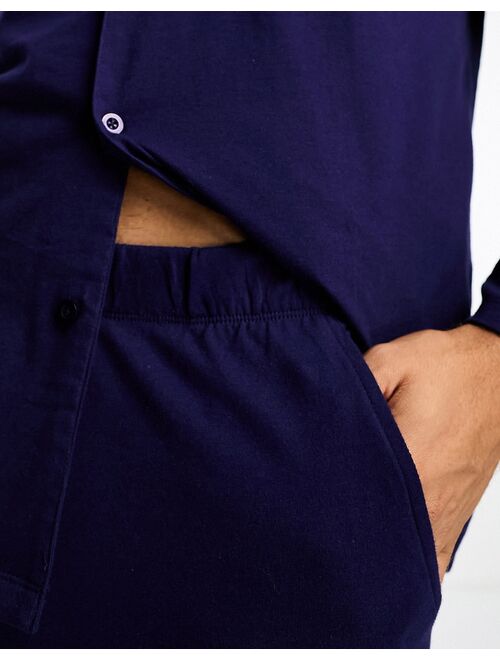 ASOS DESIGN pajama set with long sleeve shirt and pants in navy jersey