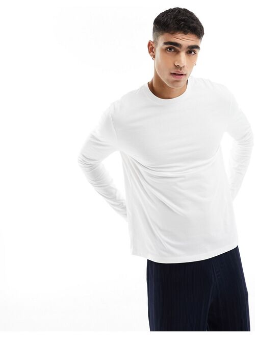 ASOS DESIGN pajama set with long sleeve white T-shirt and ribbed navy bottoms