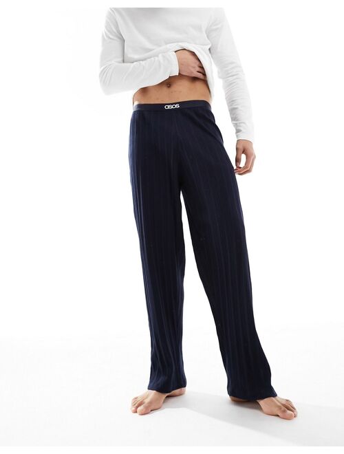 ASOS DESIGN pajama set with long sleeve white T-shirt and ribbed navy bottoms