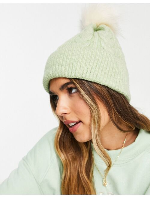 ASOS DESIGN cable knit beanie with faux fur pom in sage