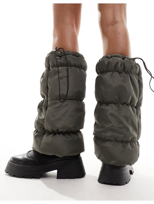 My Accessories London nylon puffer leg warmers in khaki