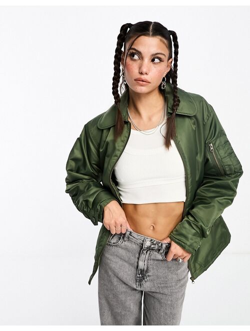 COLLUSION nylon jacket with with fitted waist in khaki