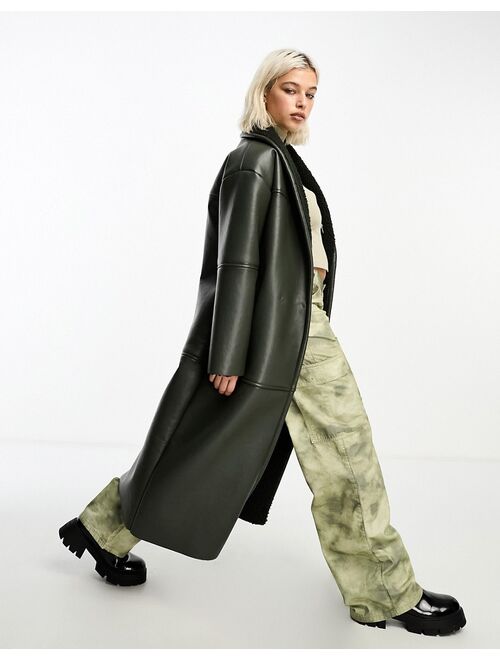 COLLUSION longline faux leather borg lined coat in khaki