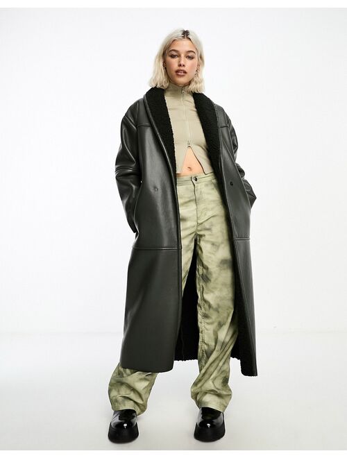 COLLUSION longline faux leather borg lined coat in khaki