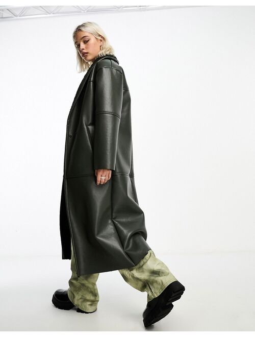 COLLUSION longline faux leather borg lined coat in khaki