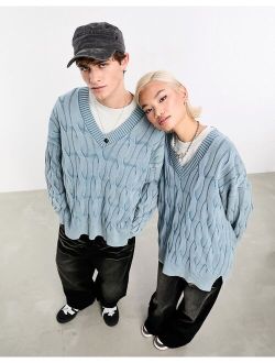 Unisex oversized washed distressed cable knit sweater in light blue