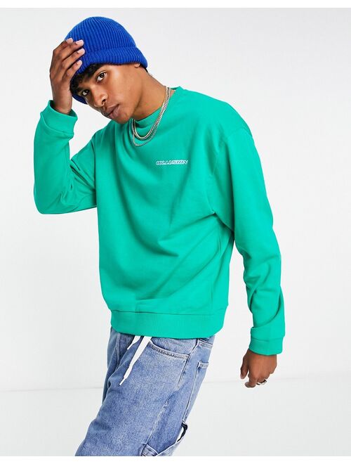 COLLUSION boxy sweatshirt with surf print in green