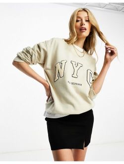 NYC terrycloth applique sweatshirt in beige